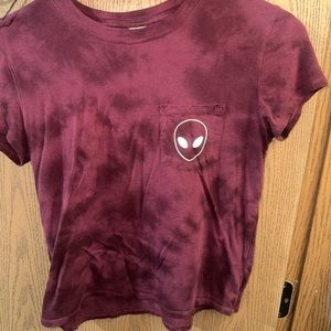 Maroon tie dye shirt with alien logo